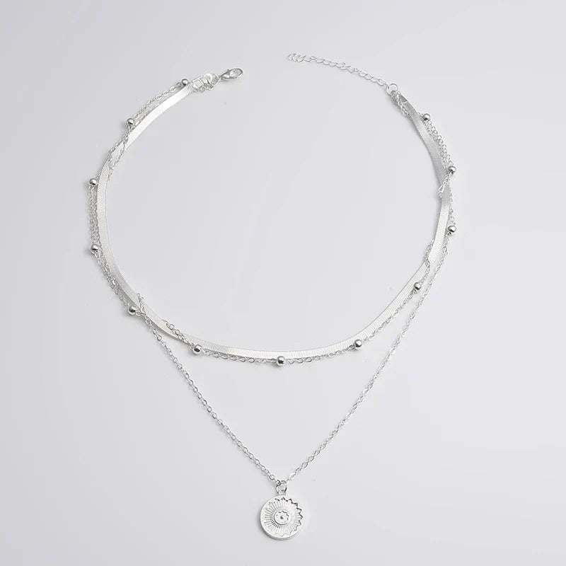 Silver triple necklace