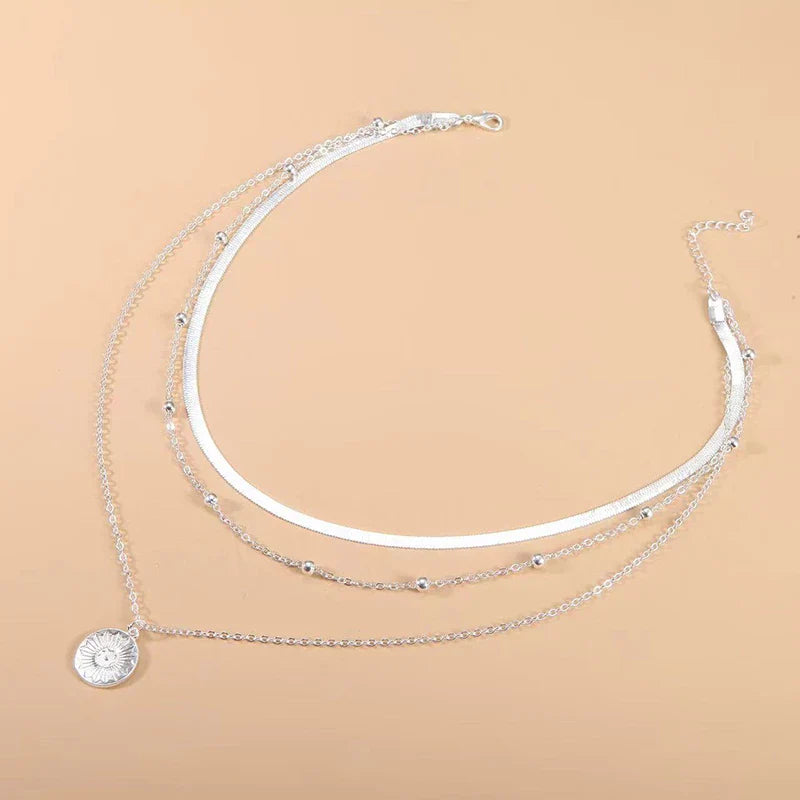 Silver triple necklace