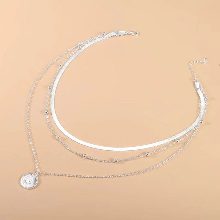 Silver triple necklace